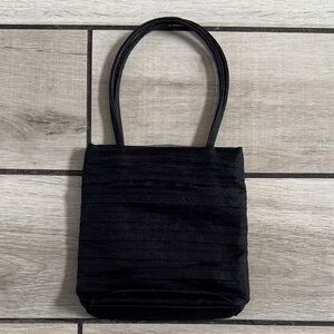 small black pleated purse